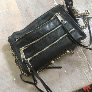 Black zipper cross body bag